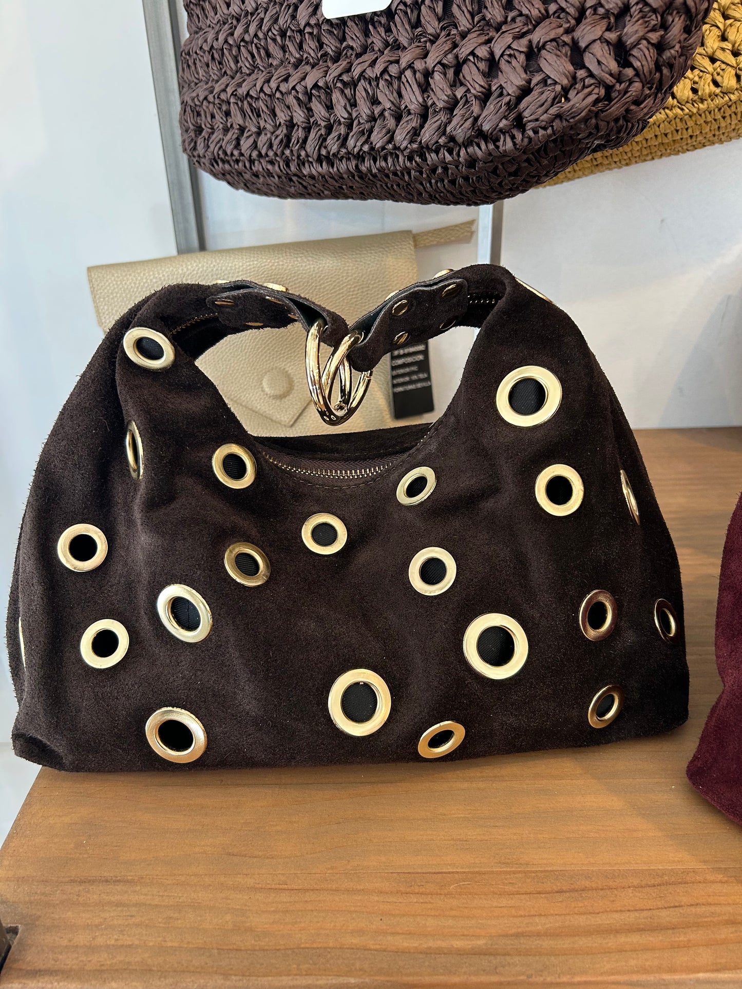 BOLSO ANTE REMACHE DORADO