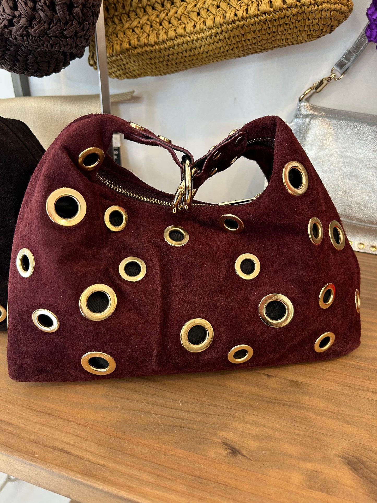 BOLSO ANTE REMACHE DORADO